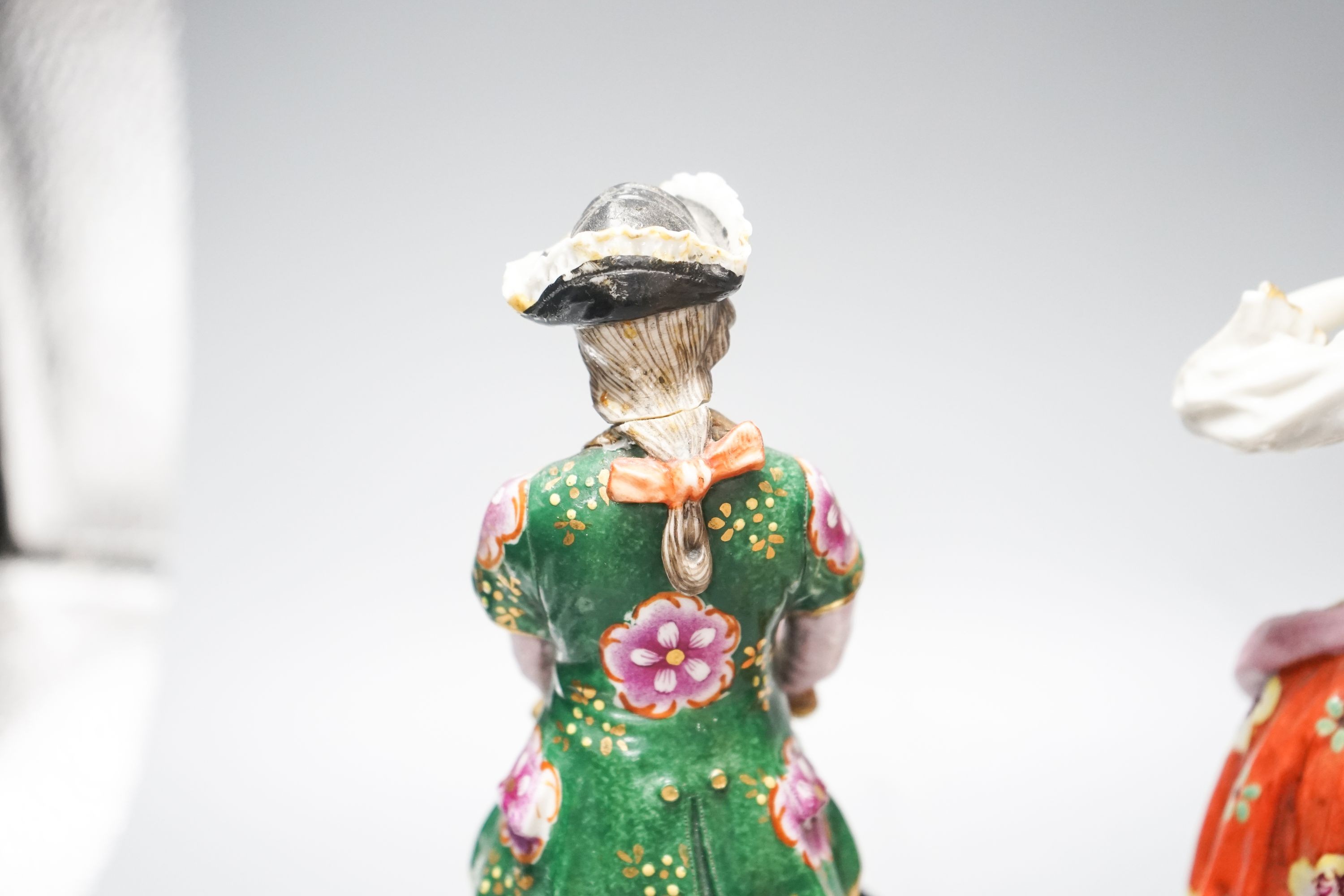 A Sitzendorf group of a Shepherd and shepherdess, three other Continental costume figures and a group (5) 27cm